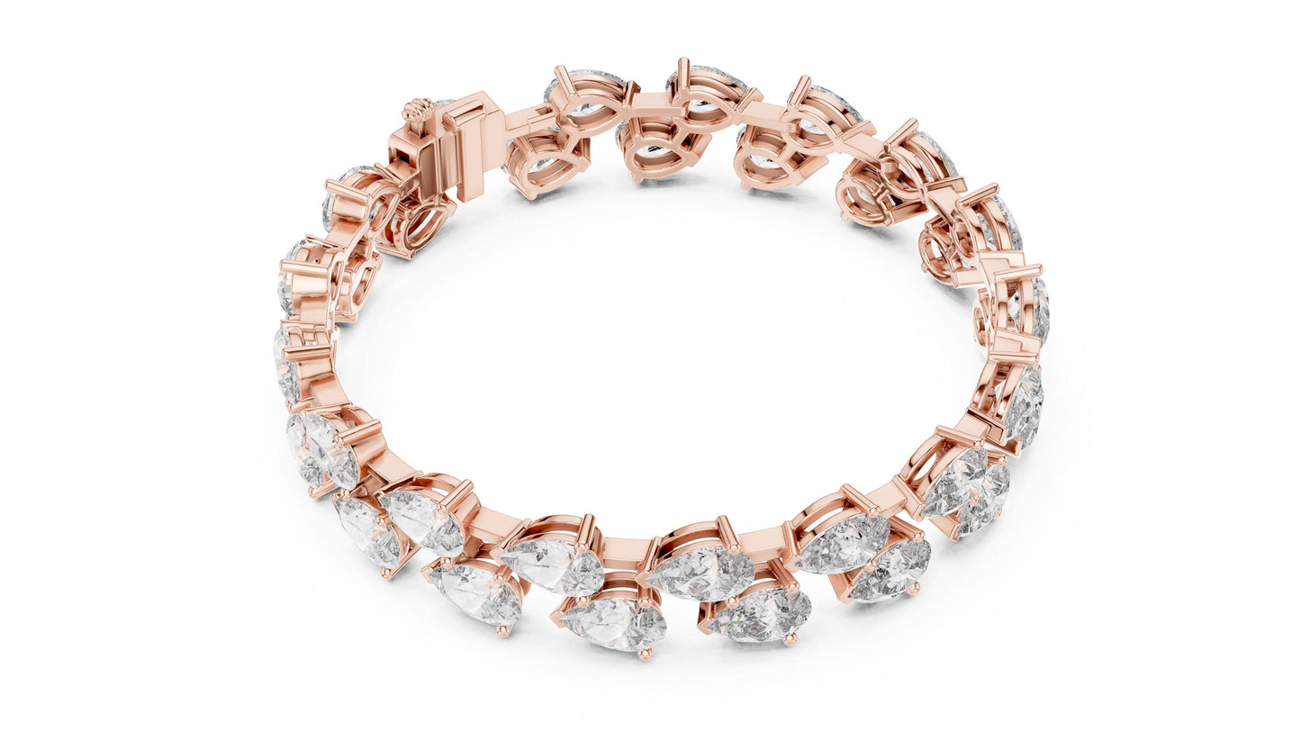 Pear cut moissanite diamond tennis bracelet in rose gold, bridal wedding jewelry, dainty luxury gift from Riora