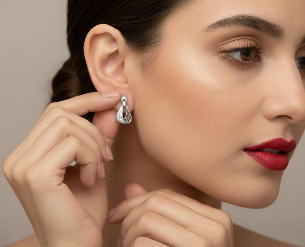 Riora Moissanite drop stud earrings in gold, silver, and rose gold with elegant bridal dangle design, perfect gift for her.