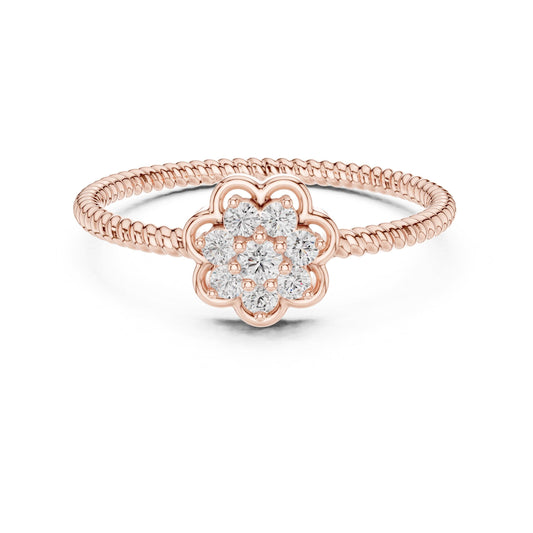 Rose gold floral moissanite diamond cluster ring with vintage flower design, perfect as an engagement or promise band.