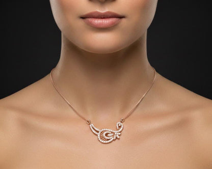 Gold moissanite leaf necklace by Riora featuring a delicate, minimalist design perfect for bridal jewelry or special occasions.
