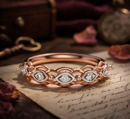 Vintage moissanite wedding band with marquise diamond style, art deco design, minimalist rose gold finish, by Riora.