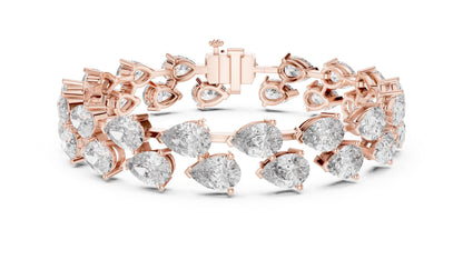 Riora pear cut moissanite diamond tennis bracelet in rose gold, featuring elegant bridal wedding jewelry with dainty, luxurious design