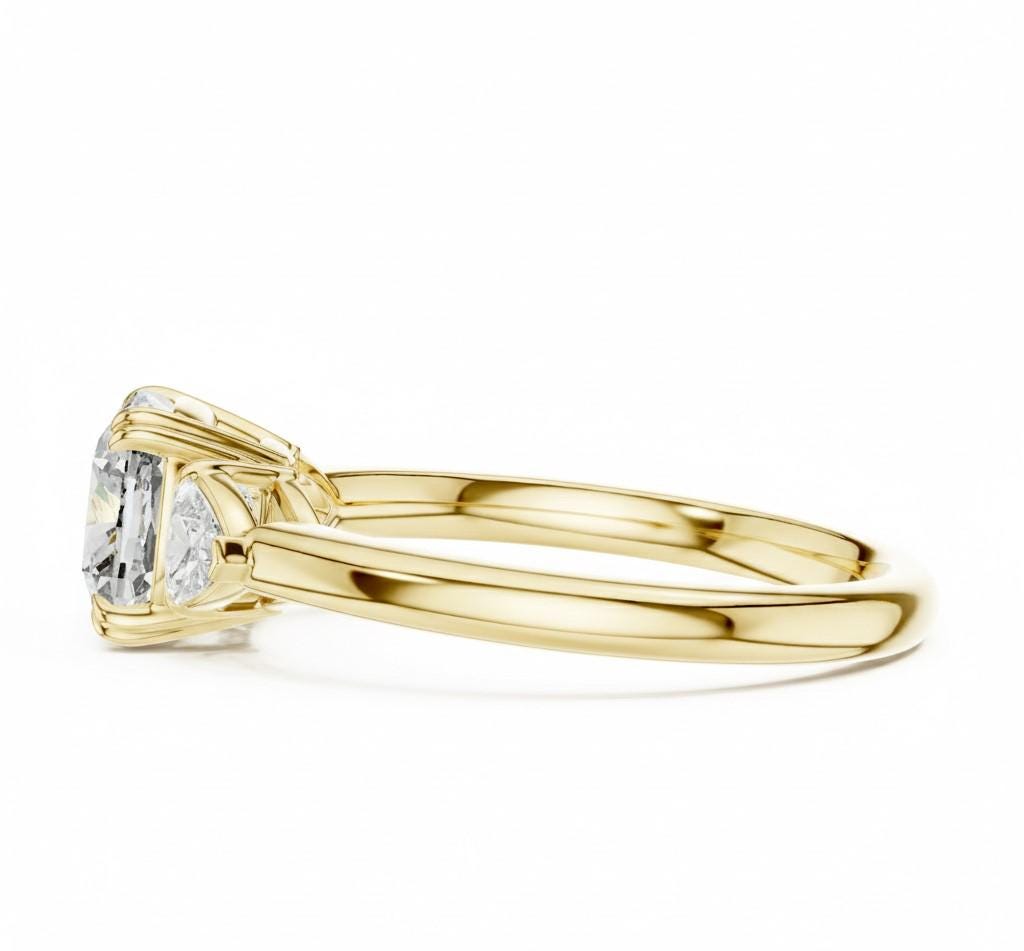 Riora elegant CZ engagement ring featuring gold, rose gold, and silver tones with a sparkling center stone and delicate band.