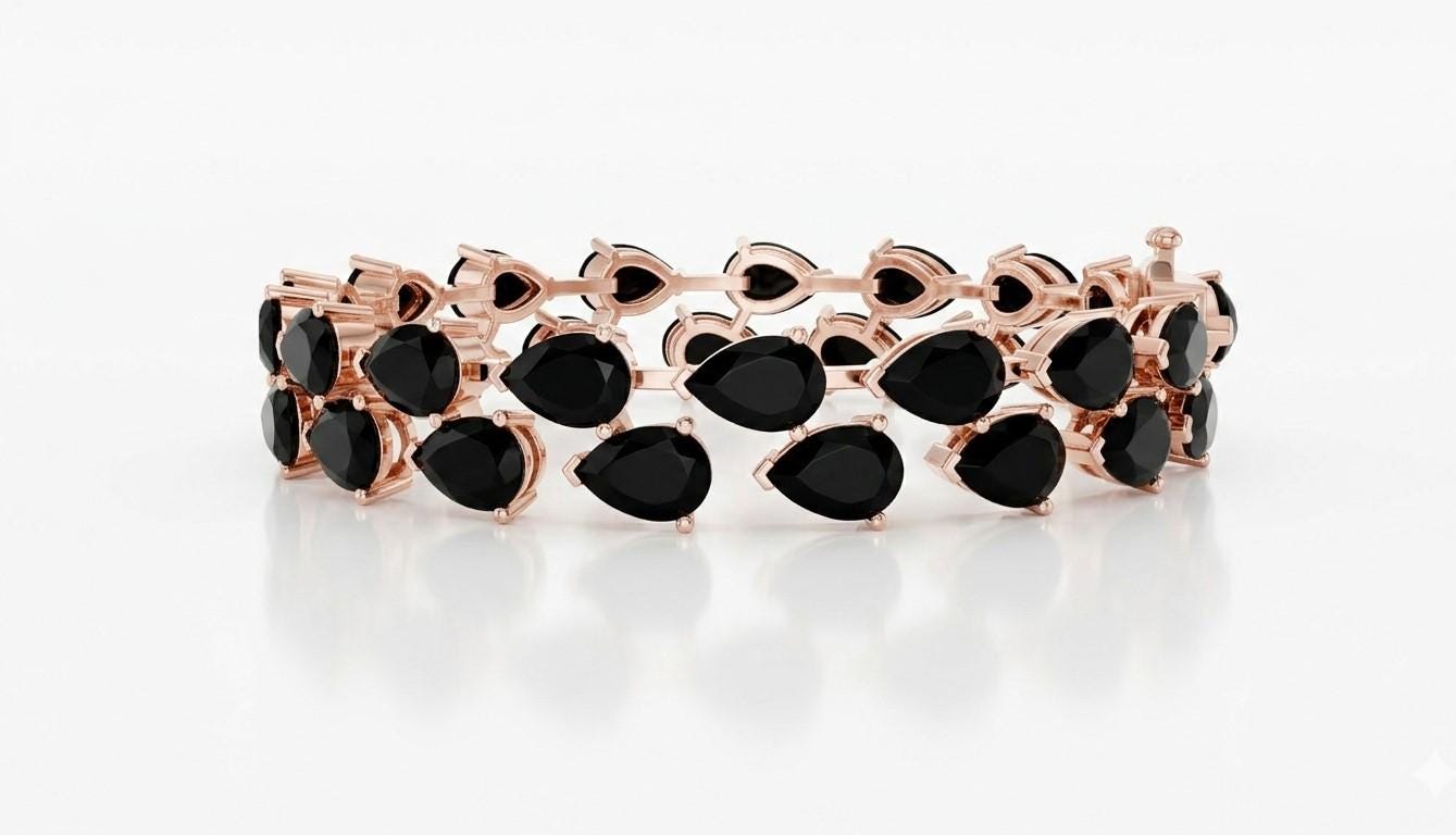 Pear cut moissanite diamond tennis bracelet in rose gold, featuring sparkling stones and delicate bridal wedding jewelry design