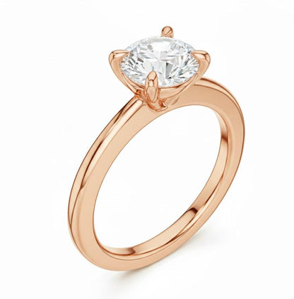 Riora minimalist gold moissanite diamond solitaire ring with a thin band, perfect for stacking or as wedding promise jewelry.
