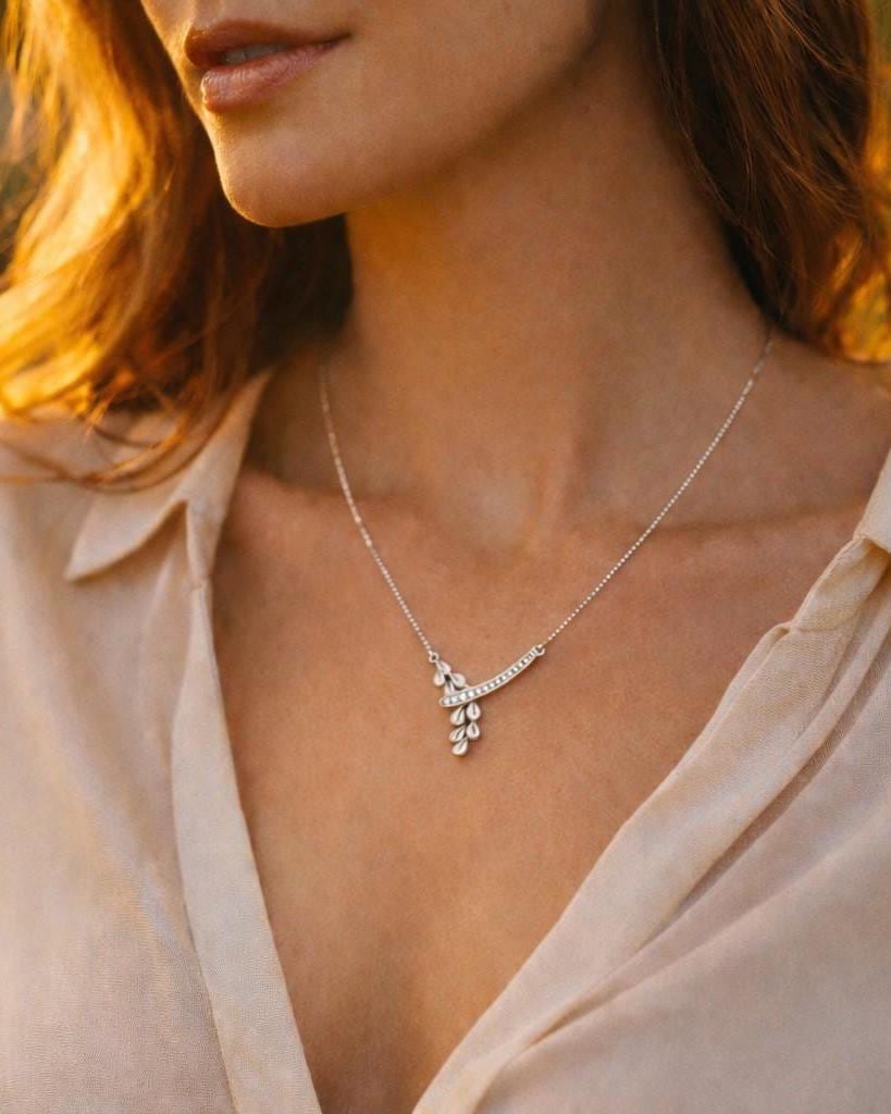 Riora Moissanite leaf drop necklace with dainty rose gold pendant, botanical jewelry for minimalist bridal or elegant occasions
