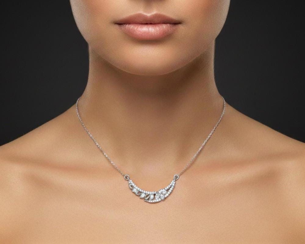 Rose gold leaf necklace with moissanite diamond accents, minimalist bridal jewelry pendant for women, elegant wedding jewelry by Riora