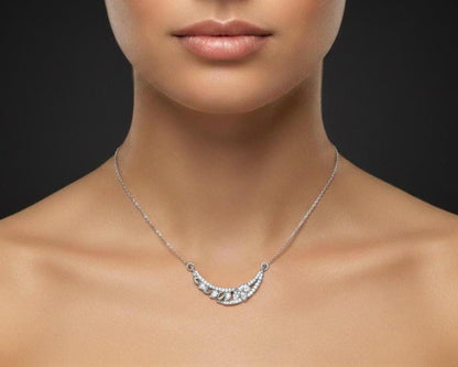 Rose gold leaf necklace with moissanite diamond accents, minimalist bridal jewelry pendant for women, elegant wedding jewelry by Riora