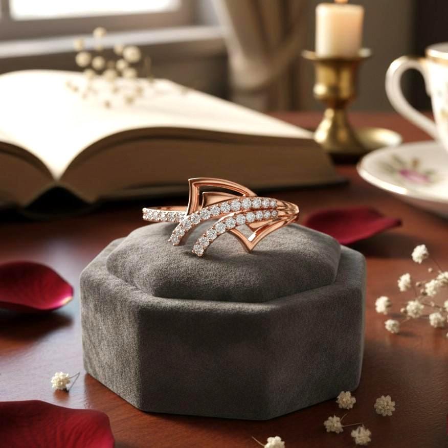 Riora elegant moissanite diamond wave ring for women, minimalist stacking wedding band with dainty rose gold finish.