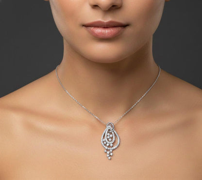 Elegant moissanite teardrop pendant necklace in gold, rose gold, or silver, featuring a sparkling bridal or Valentine's jewelry design.