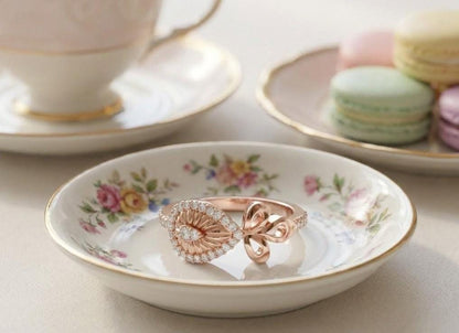 Vintage eye-shaped bow ring by Riora featuring moissanite and diamond accents, dainty evil band for women’s jewelry.