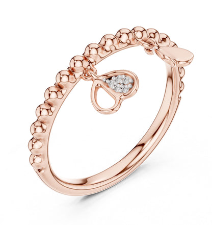 Riora rose gold moissanite heart charm dangle ring with beaded band, romantic minimal jewelry for women.