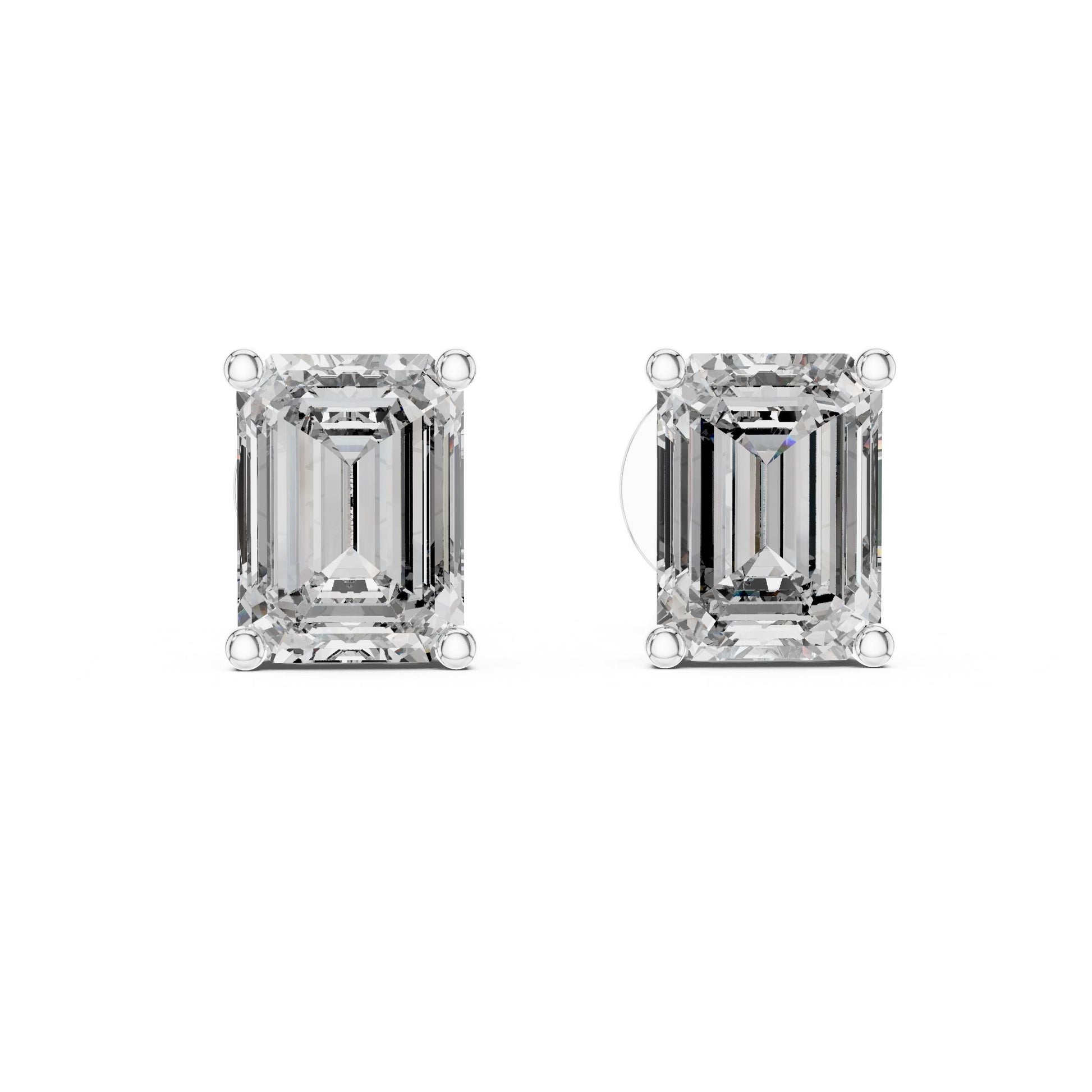 Riora emerald cut moissanite diamond stud earrings, 7.5x5.5mm, minimalist bridal jewelry for wedding or everyday wear.