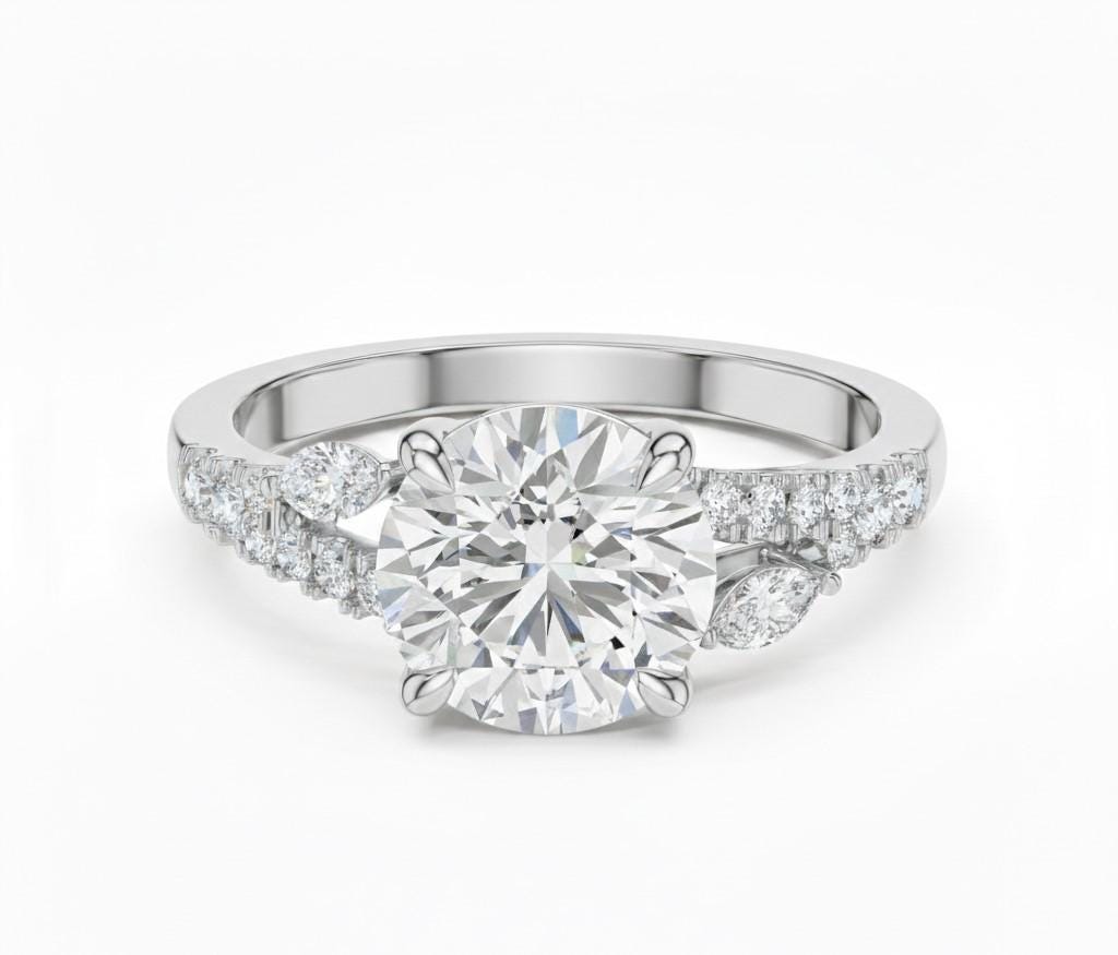 Rose gold and silver luxury engagement ring by Riora featuring romantic, nickel-free bridal promise jewelry with elegant design.