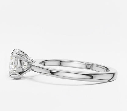 Riora minimalist gold moissanite solitaire promise ring with a thin stackable band and elegant dainty design.