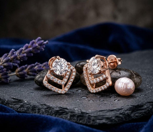 Geometric moissanite diamond stud earrings in gold and rose gold with minimalist triangle design, elegant jewelry gift from Riora