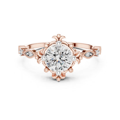 Riora floral moissanite engagement ring with round cut stone, rose gold antique-inspired bridal ring, intricate floral design.