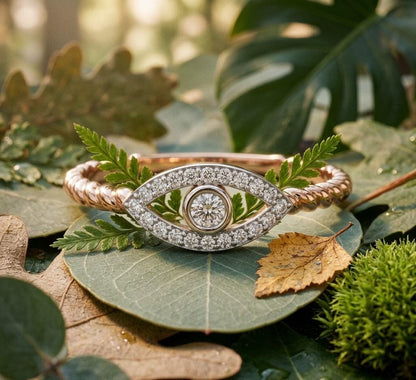 Rose gold evil eye moissanite ring with dainty diamond band, minimalist eye jewelry for stacking, by Riora.