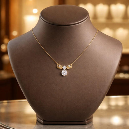 Rose gold moissanite leaf pendant necklace with dainty diamond-like sparkle, elegant bridal jewelry by Riora.