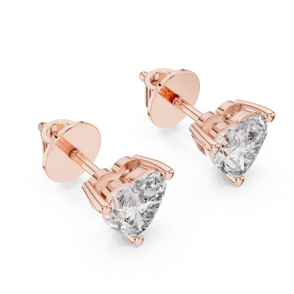 Rose gold 6mm heart-shaped moissanite stud earrings by Riora, minimalist love jewelry for women, shown on a white background.