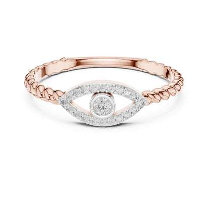 Rose gold evil eye moissanite ring with dainty diamond band, minimalist stacking jewelry by Riora, featuring eye-shaped design.
