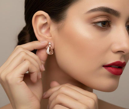 Riora moissanite drop stud earrings in gold, silver, and rose gold with elegant dangle design for bridal or gift occasions