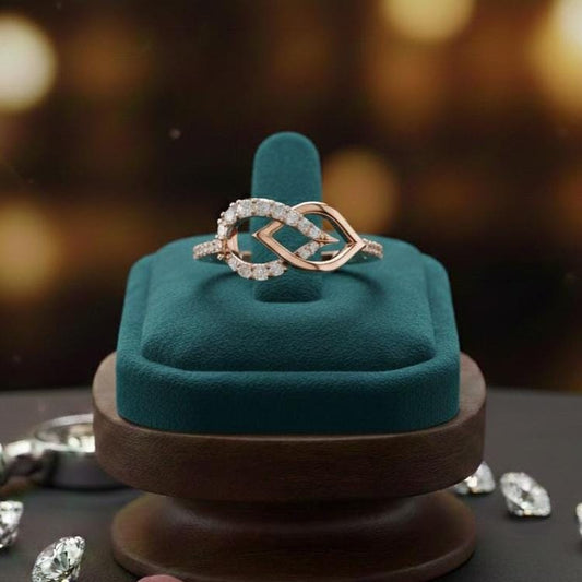 Rose gold infinity heart moissanite diamond ring featuring a delicate promise band with romantic love design by Riora.