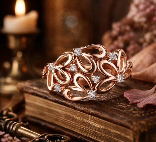 Riora moissanite floral cluster ring in rose gold with diamond accents, vintage style bridal and anniversary jewelry.