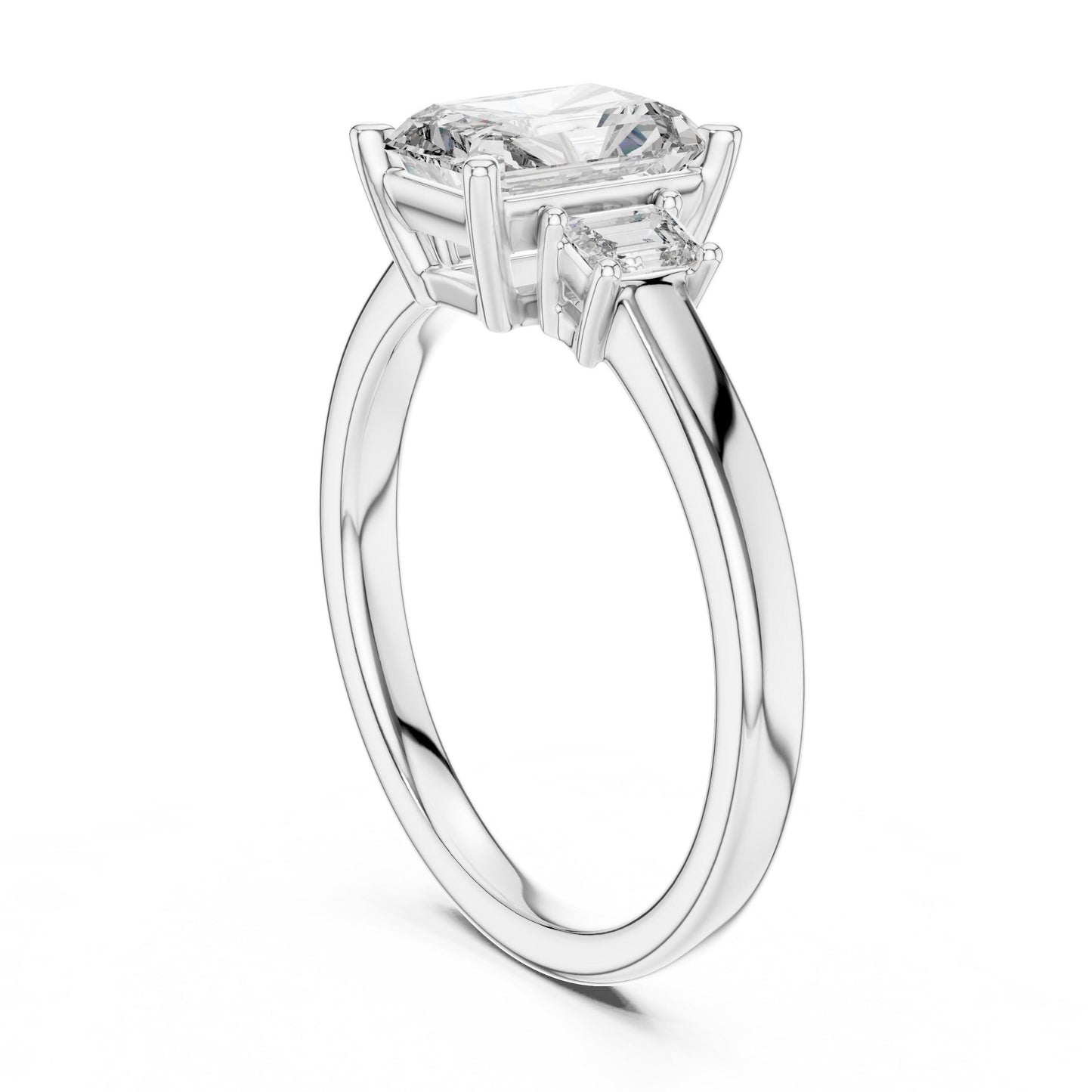 Elegant emerald-cut cubic zirconia engagement ring with gold rose silver band, hypoallergenic bridal jewelry by Riora.