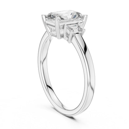 Elegant emerald-cut cubic zirconia engagement ring with gold rose silver band, hypoallergenic bridal jewelry by Riora.