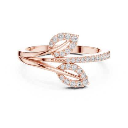 Rose gold Leaf Wrap Moissanite diamond engagement ring featuring botanical design, dainty wedding band, by Riora.