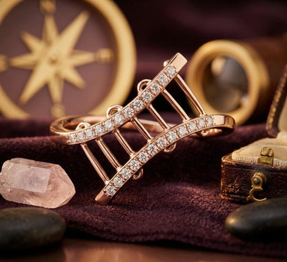 Riora curved moissanite crossover ring with open ladder design in rose gold, minimalist statement band for women.