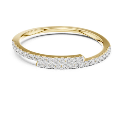 Rose gold moissanite curved wedding band with half eternity diamond style, minimalist stacking ring by Riora, showcasing sparkling stones.