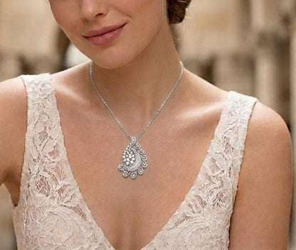 Riora paisley moissanite diamond pendant necklace with teardrop shape, elegant sparkle, perfect for weddings or special occasions.