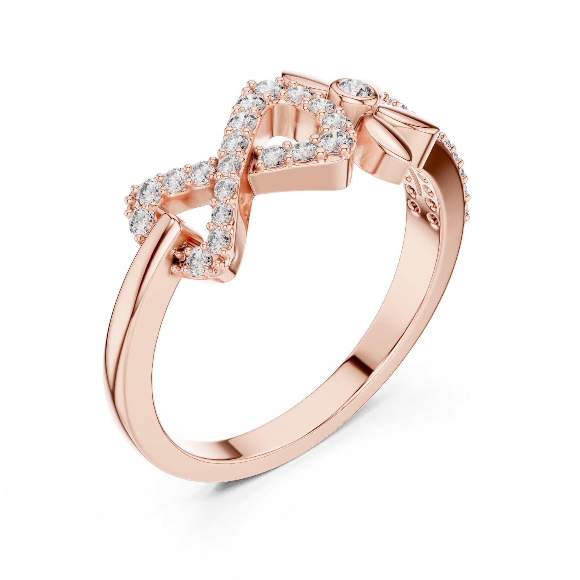 Gold infinity flower ring with moissanite diamonds, featuring a minimalist floral design, ideal for engagement or gift from Riora.