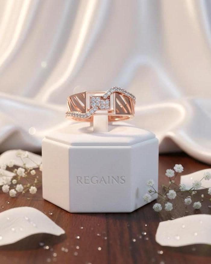 Riora geometric wave CZ wide band ring in gold and silver, hypoallergenic luxury jewelry for anniversary or Valentine gifts.