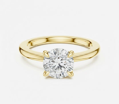 Riora minimalist gold moissanite diamond solitaire ring with a dainty thin band, perfect for stacking or wedding jewelry.