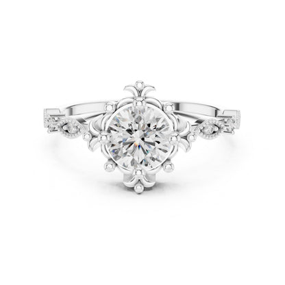 Rose gold floral moissanite engagement ring with round cut center stone and antique-inspired design, perfect for a bridal wedding ring.