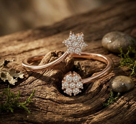 Riora gold rose gold moissanite open bypass ring with double cluster floral halo design and diamond style accents.