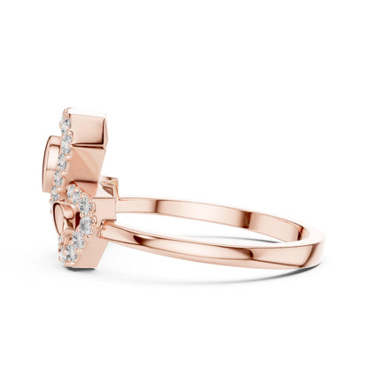 Rose gold moissanite diamond ring with a bow knot design, featuring minimalist dainty bridal jewelry by Riora