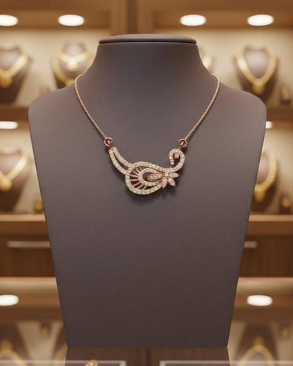Gold moissanite leaf necklace by Riora featuring a delicate, minimalist design perfect for bridal or wedding jewelry.