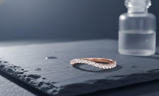 Riora moissanite curved wedding band in gold, nickel-free hypoallergenic ring with minimal diamond accents, stacking jewelry.
