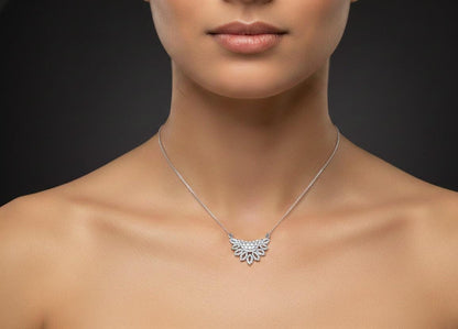 Dainty butterfly-shaped moissanite diamond necklace by Riora with gold, rose, and silver tones, minimalist jewelry pendant for women