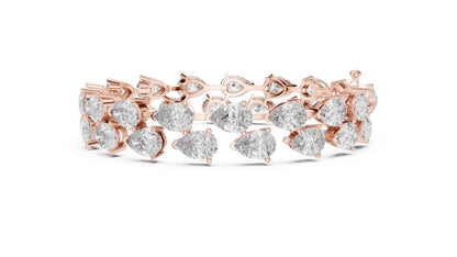 Rose gold pear cut moissanite diamond tennis bracelet featuring delicate, sparkling stones perfect for bridal or wedding jewelry.