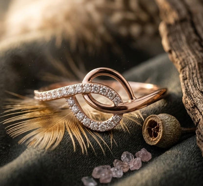 Riora infinity moissanite ring with twisted knot design in rose gold and silver, romantic engagement or gift jewelry.