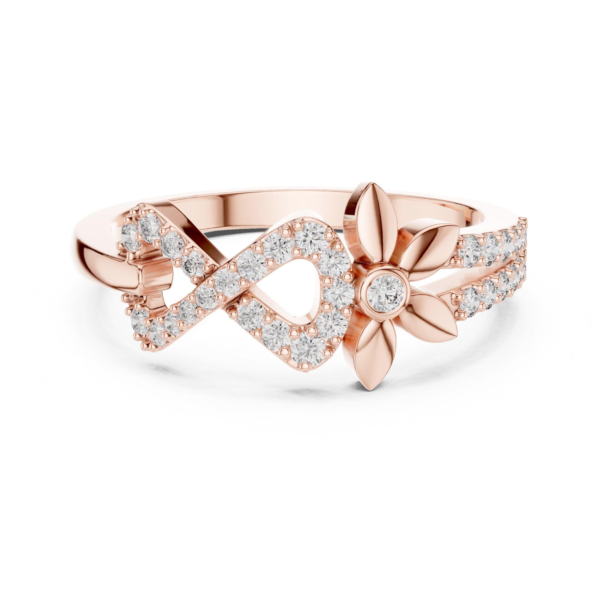 Gold infinity flower ring with moissanite diamonds, delicate floral design, minimalist engagement ring by Riora.