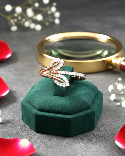 Rose gold Leaf Wrap Moissanite diamond engagement ring with botanical design, dainty wedding band by Riora.