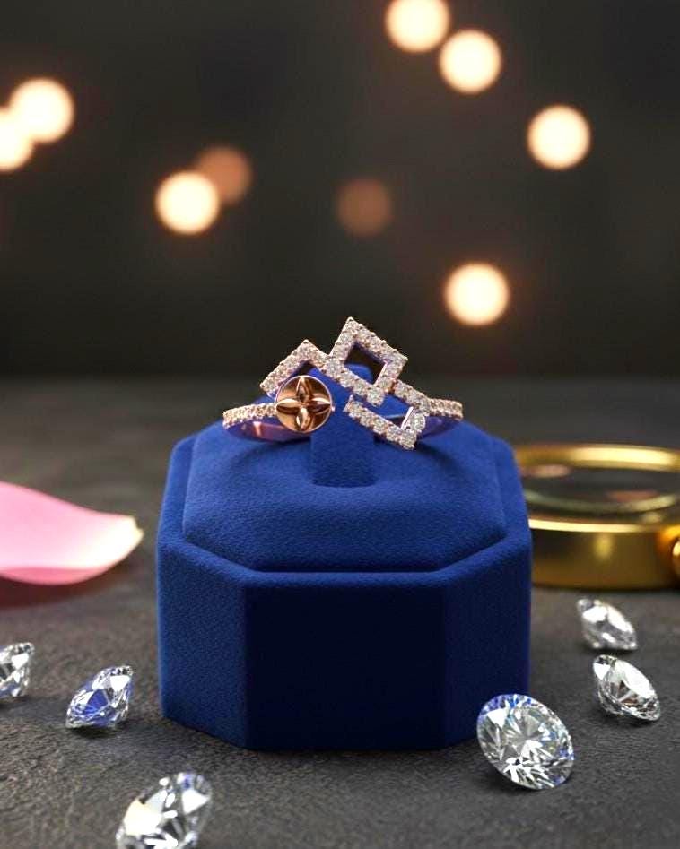 Gold geometric Moissanite diamond statement ring by Riora featuring modern minimalist design and dainty luxury jewelry style.