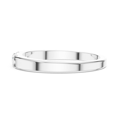 Riora moissanite wedding band in rose gold with minimalist stackable design, featuring small diamond accents for women.