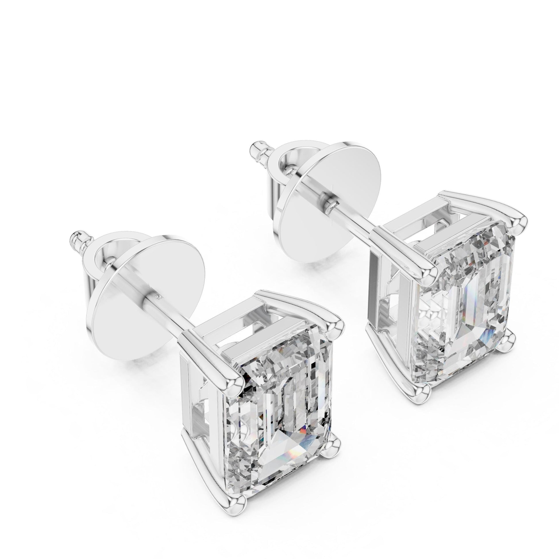 Riora emerald cut moissanite diamond stud earrings, 7.5x5.5mm, minimalist bridal jewelry for wedding or everyday luxury.